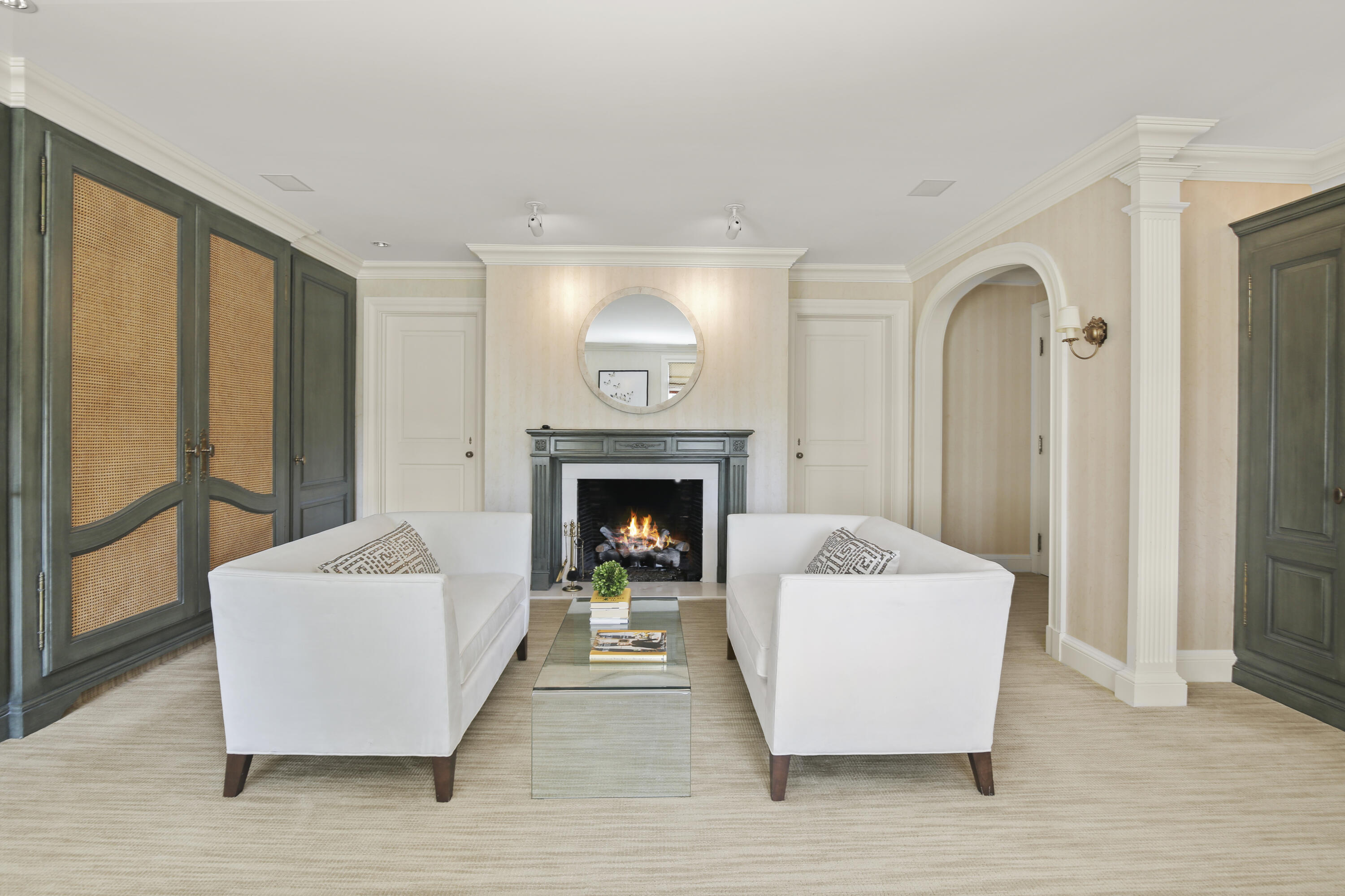707 West Road New Canaan, CT 06840 - Photo 36 of 58 a living room with furniture and a fireplace