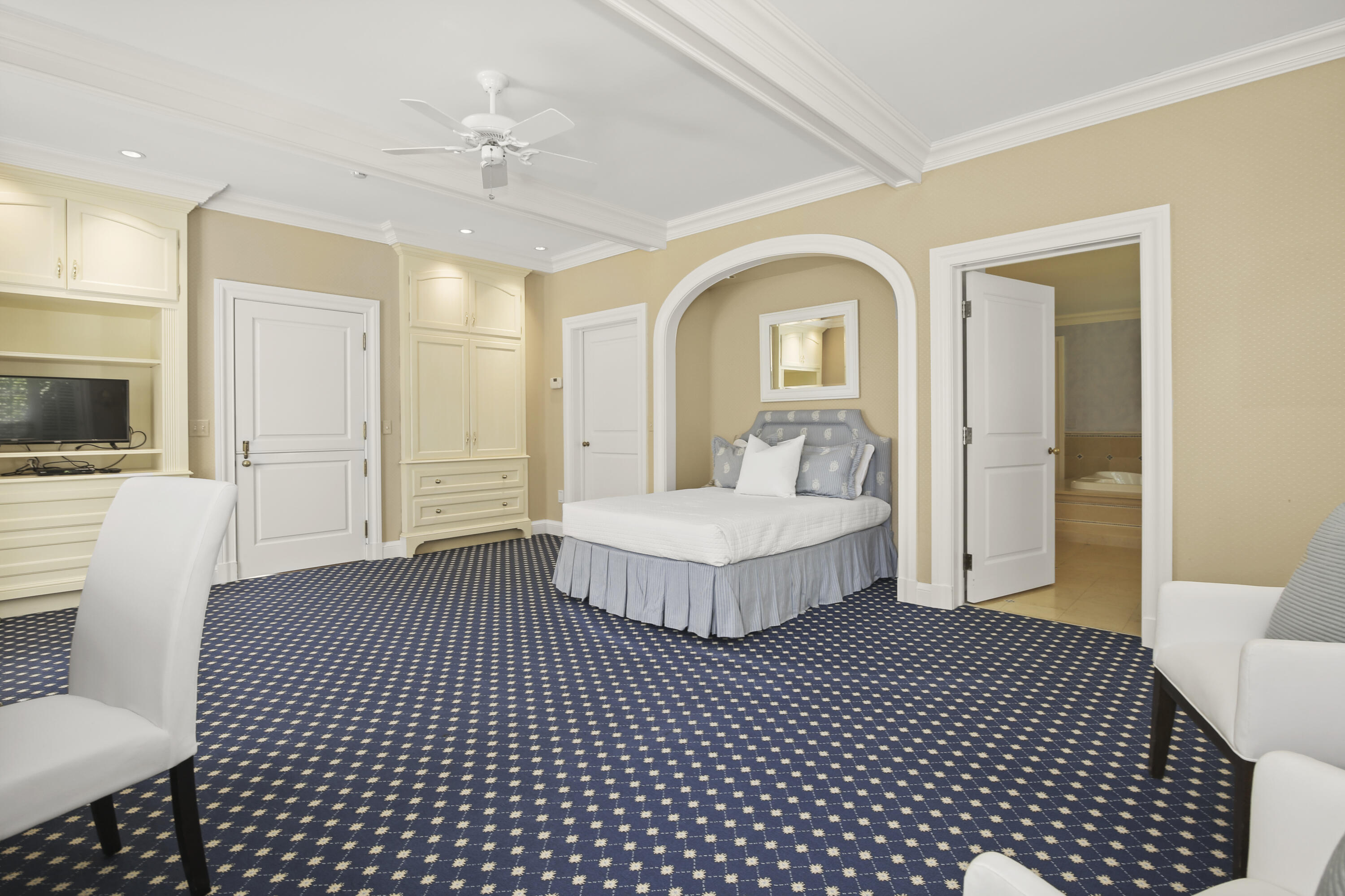 707 West Road New Canaan, CT 06840 - Photo 42 of 58 a bedroom with a bed and a television