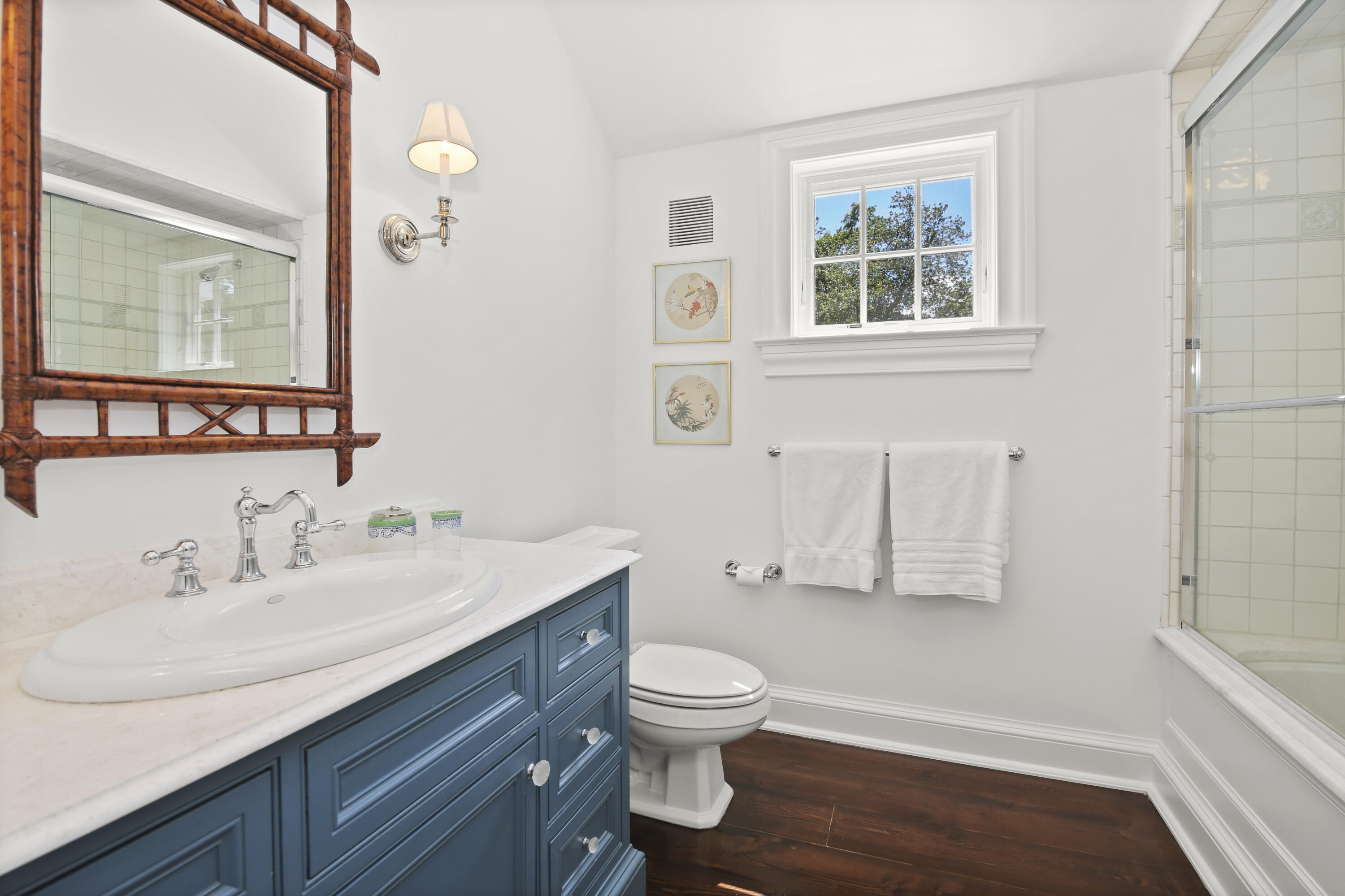 707 West Road New Canaan, CT 06840 - Photo 49 of 58 a bathroom with a sink toilet a mirror and shower