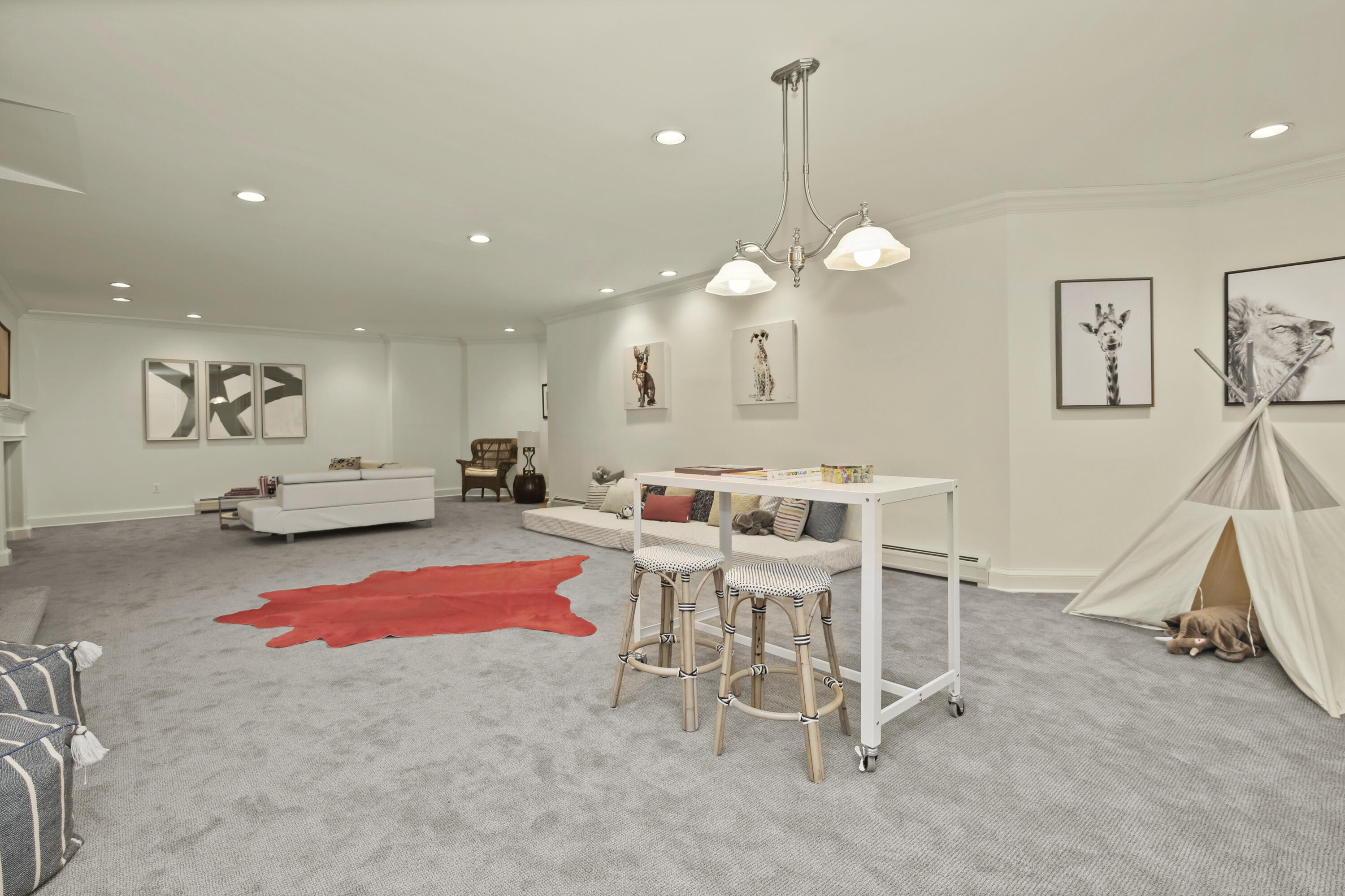 707 West Road New Canaan, CT 06840 - Photo 51 of 58 a living room with furniture a rug and white walls