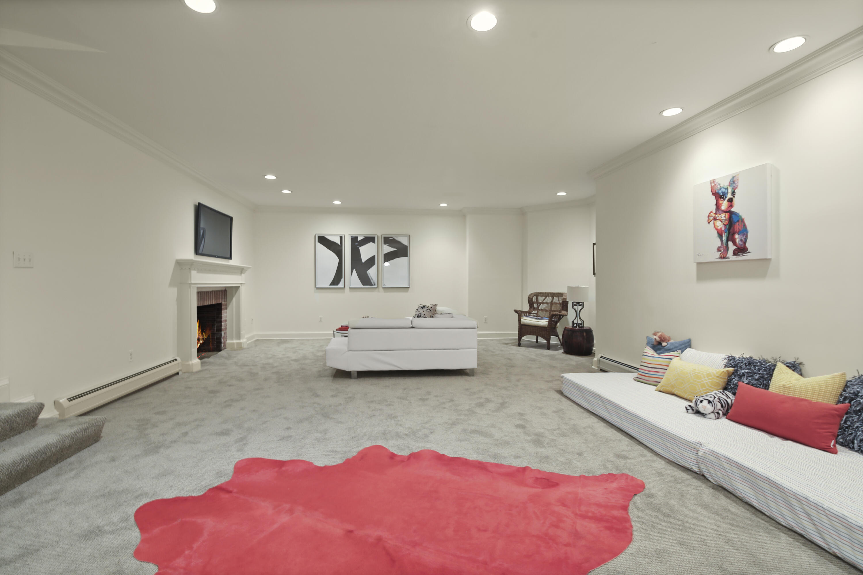 707 West Road New Canaan, CT 06840 - Photo 52 of 58 a bedroom with furniture and a fireplace