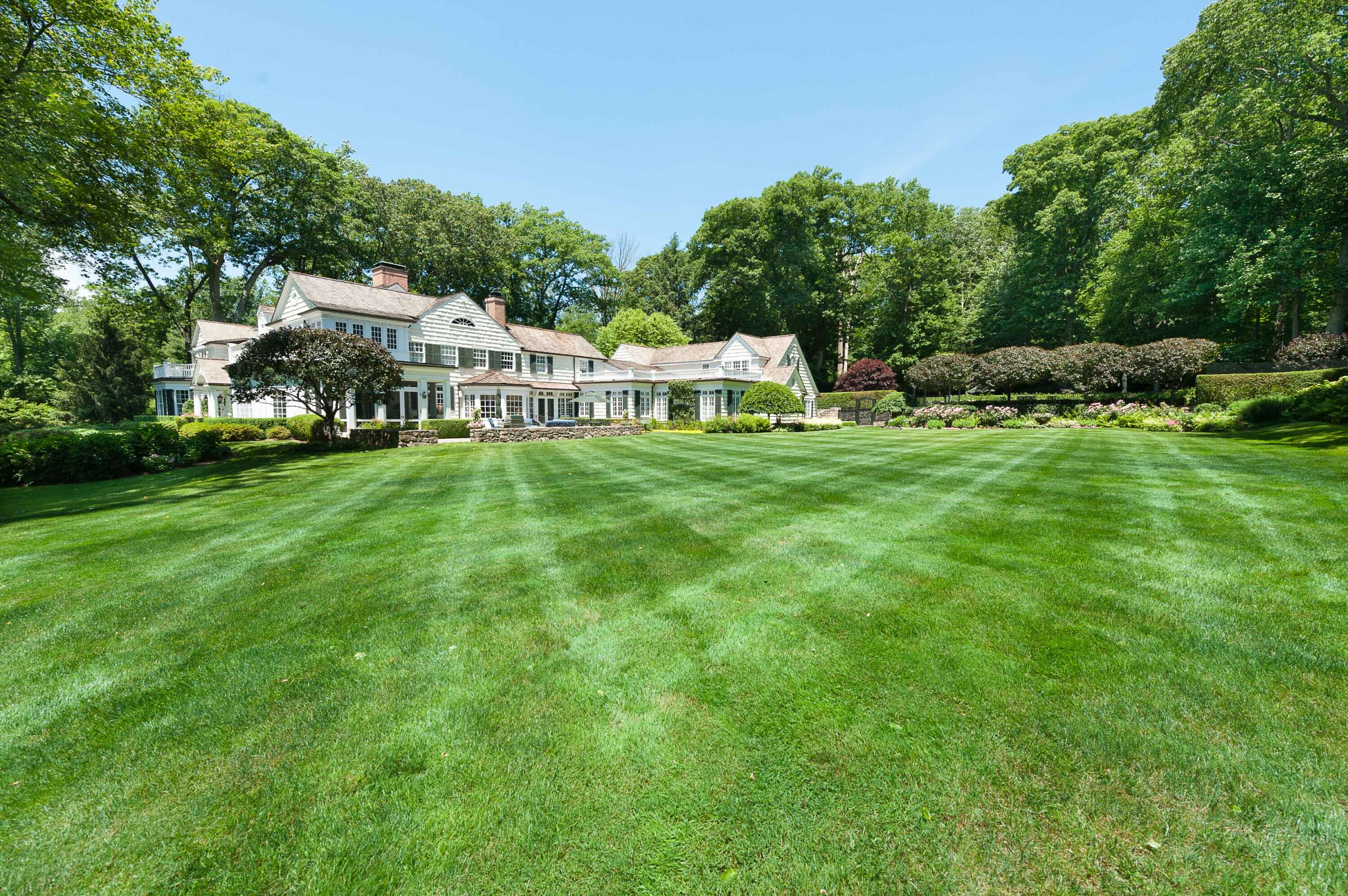 707 West Road New Canaan, CT 06840 - Photo 56 of 58 a view of a house with a big yard