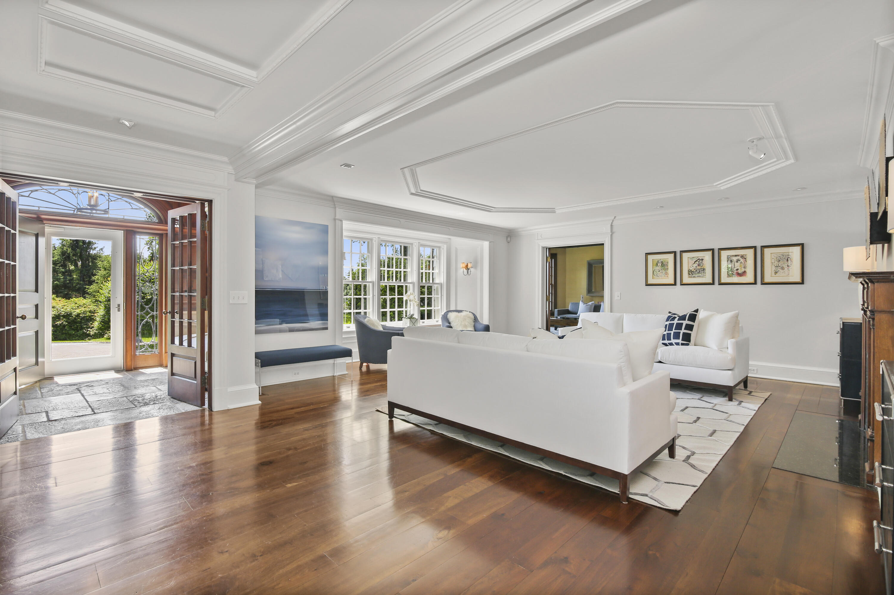 707 West Road New Canaan, CT 06840 - Photo 8 of 58 a living room with furniture wooden floor and a large window