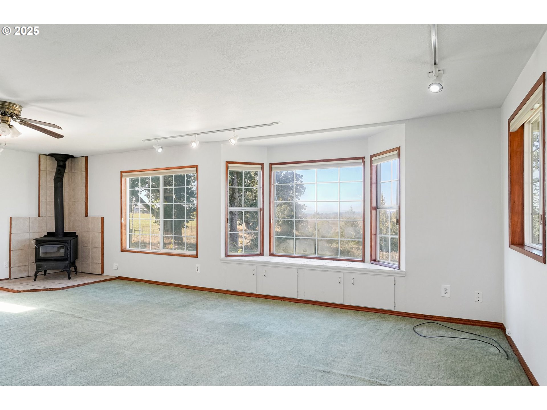 41036 Stayton Scio Road Southeast Stayton, OR 97383 - Photo 8 of 47 a view of an empty room with a window