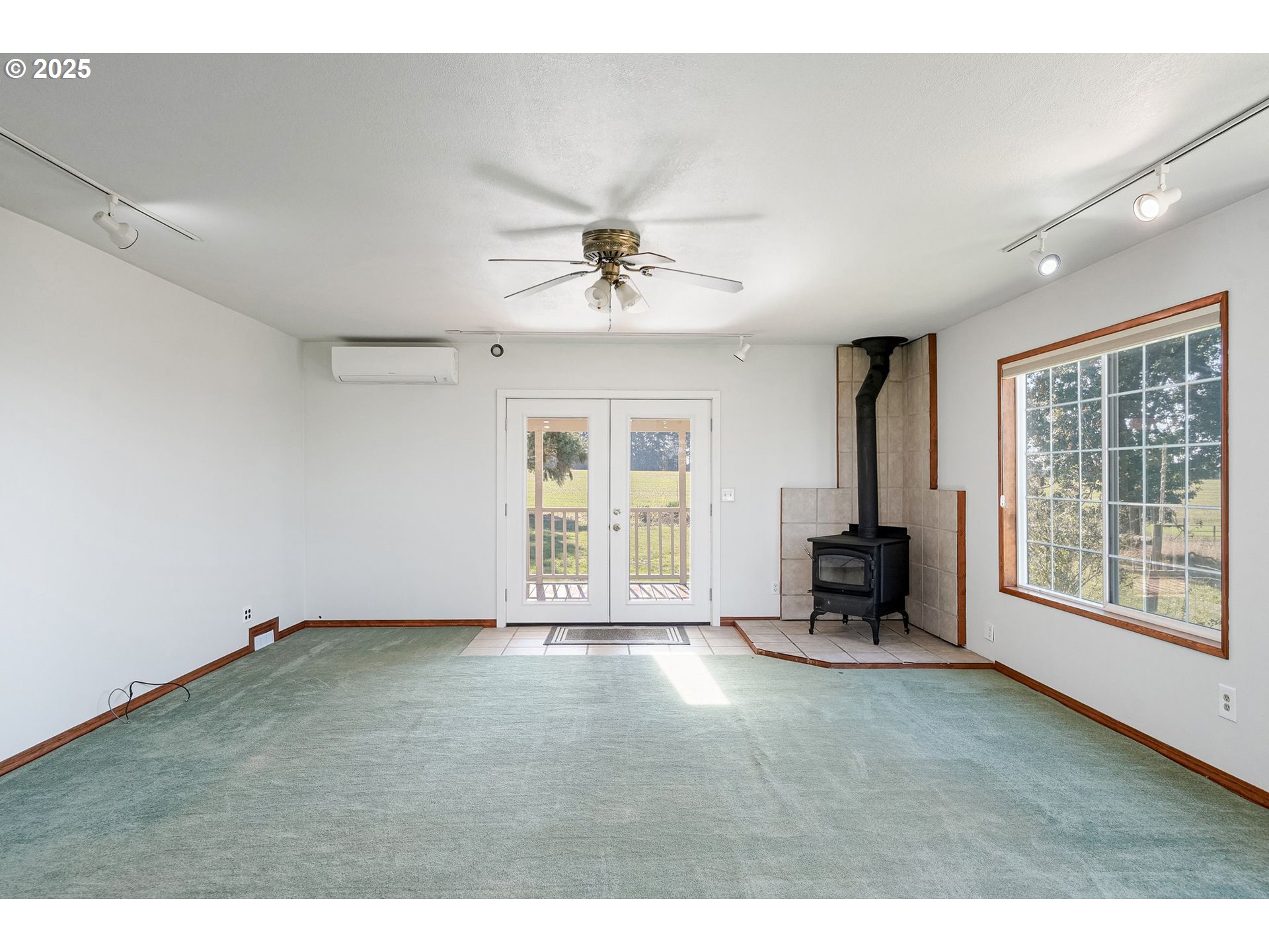41036 Stayton Scio Road Southeast Stayton, OR 97383 - Photo 9 of 47 a view of an empty room with a window