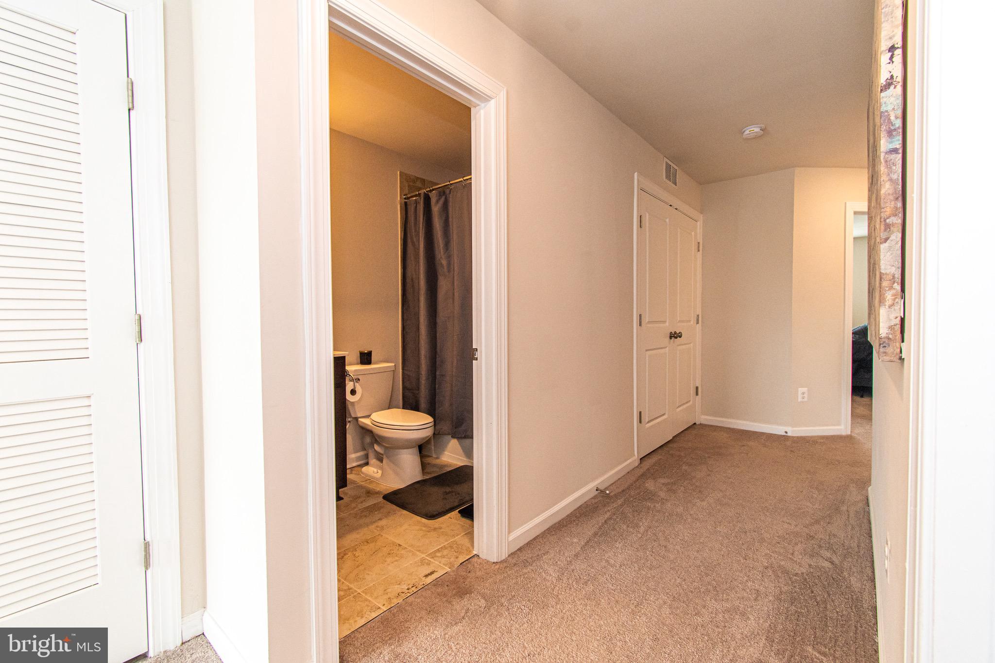 9637 Block Street Lanham, MD 20706 - Photo 31 of 47 a view of a bathroom with a toilet