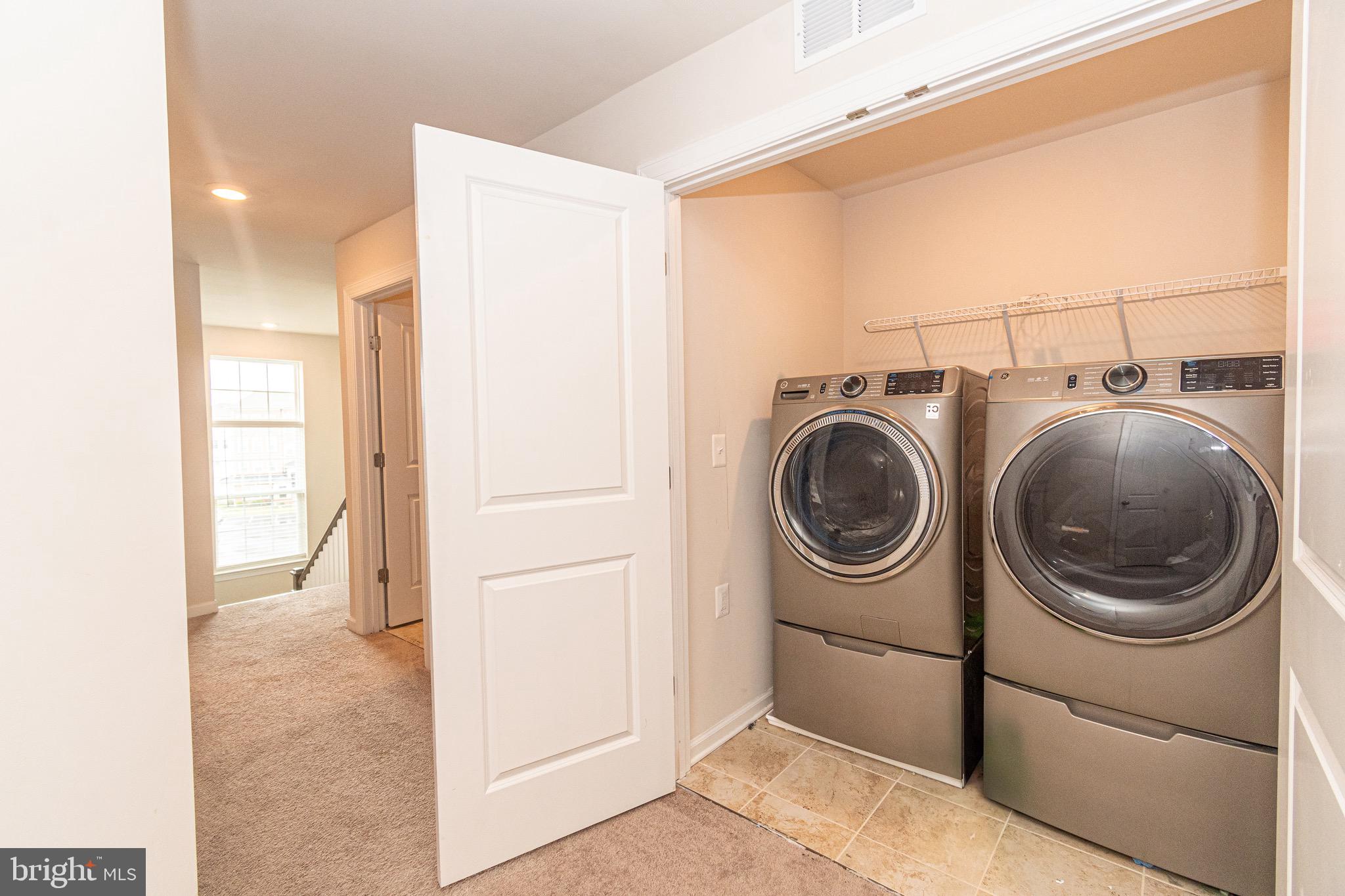 9637 Block Street Lanham, MD 20706 - Photo 36 of 47 a utility room with dryer and washer