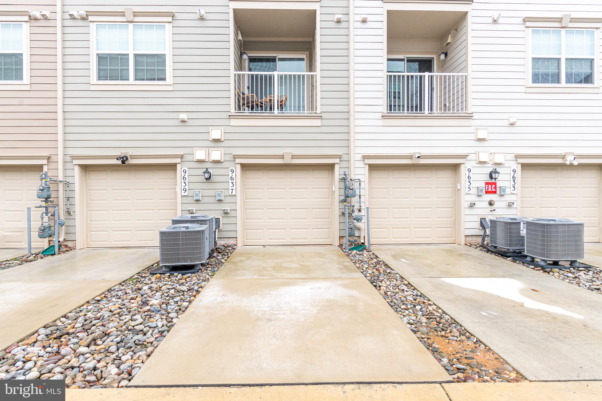 9637 Block Street Lanham, MD 20706 - Photo 45 of 47 a front view of a house with a garage