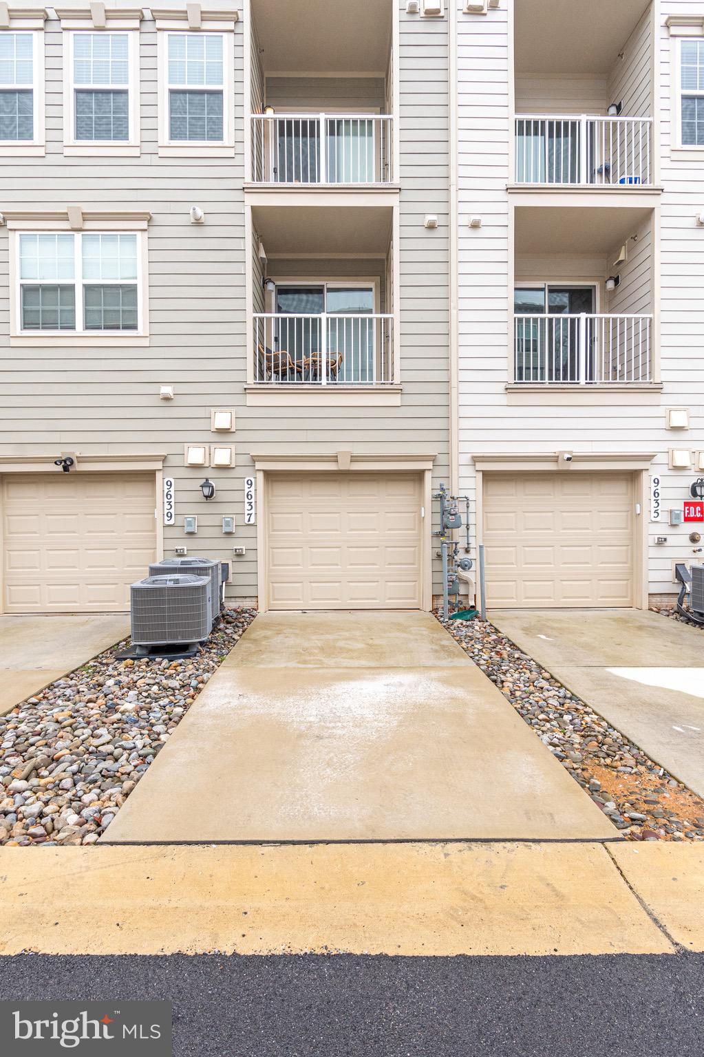 9637 Block Street Lanham, MD 20706 - Photo 46 of 47 a front view of a house with a yard