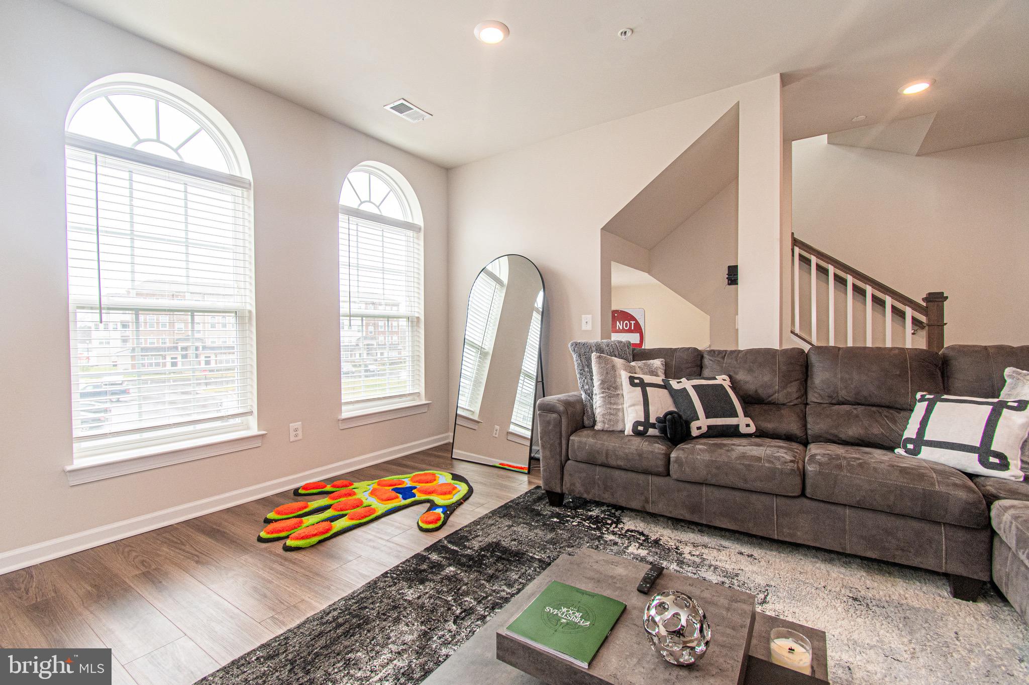 9637 Block Street Lanham, MD 20706 - Photo 8 of 47 a living room with furniture and a window