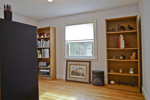 40 Mill Road Boxford, MA 01921 - Photo 14 of 20 a view of a livingroom with shelves