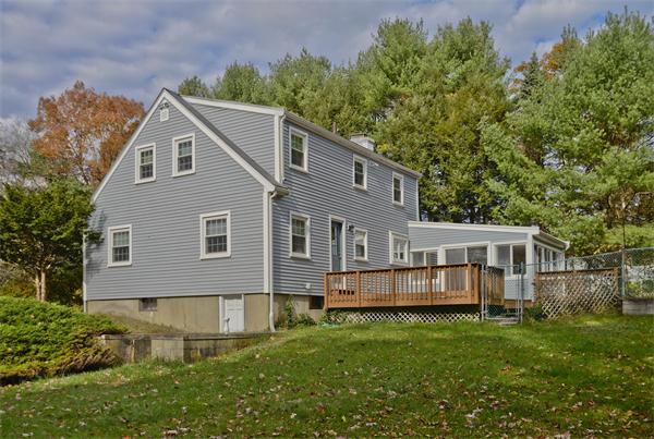 40 Mill Road Boxford, MA 01921 - Photo 17 of 20 a view of a house with a yard and sitting area