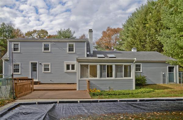 40 Mill Road Boxford, MA 01921 - Photo 19 of 20 a front view of a house with a yard
