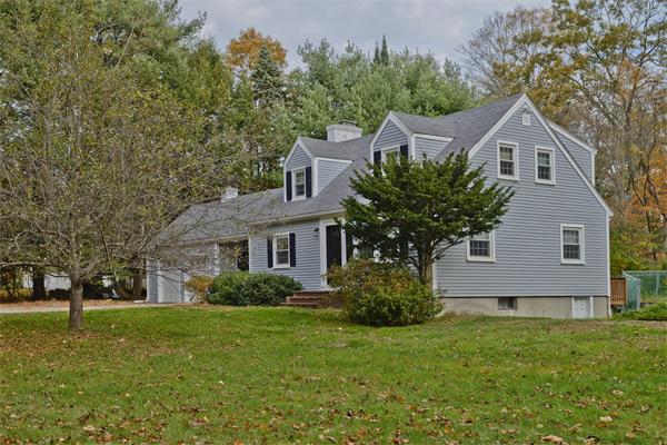 40 Mill Road Boxford, MA 01921 - Photo 20 of 20 a front view of a house with garden