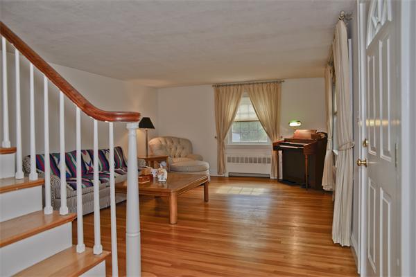 40 Mill Road Boxford, MA 01921 - Photo 6 of 20 a living room with furniture and a wooden floor