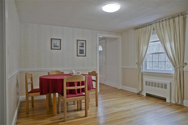 40 Mill Road Boxford, MA 01921 - Photo 9 of 20 a view of a dining room with furniture window and wooden floor