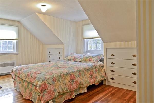 40 Mill Road Boxford, MA 01921 - Photo 10 of 20 a bedroom with a bed and a window