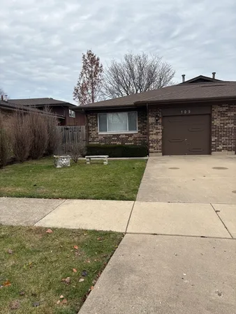 a view of a yard in front of a house