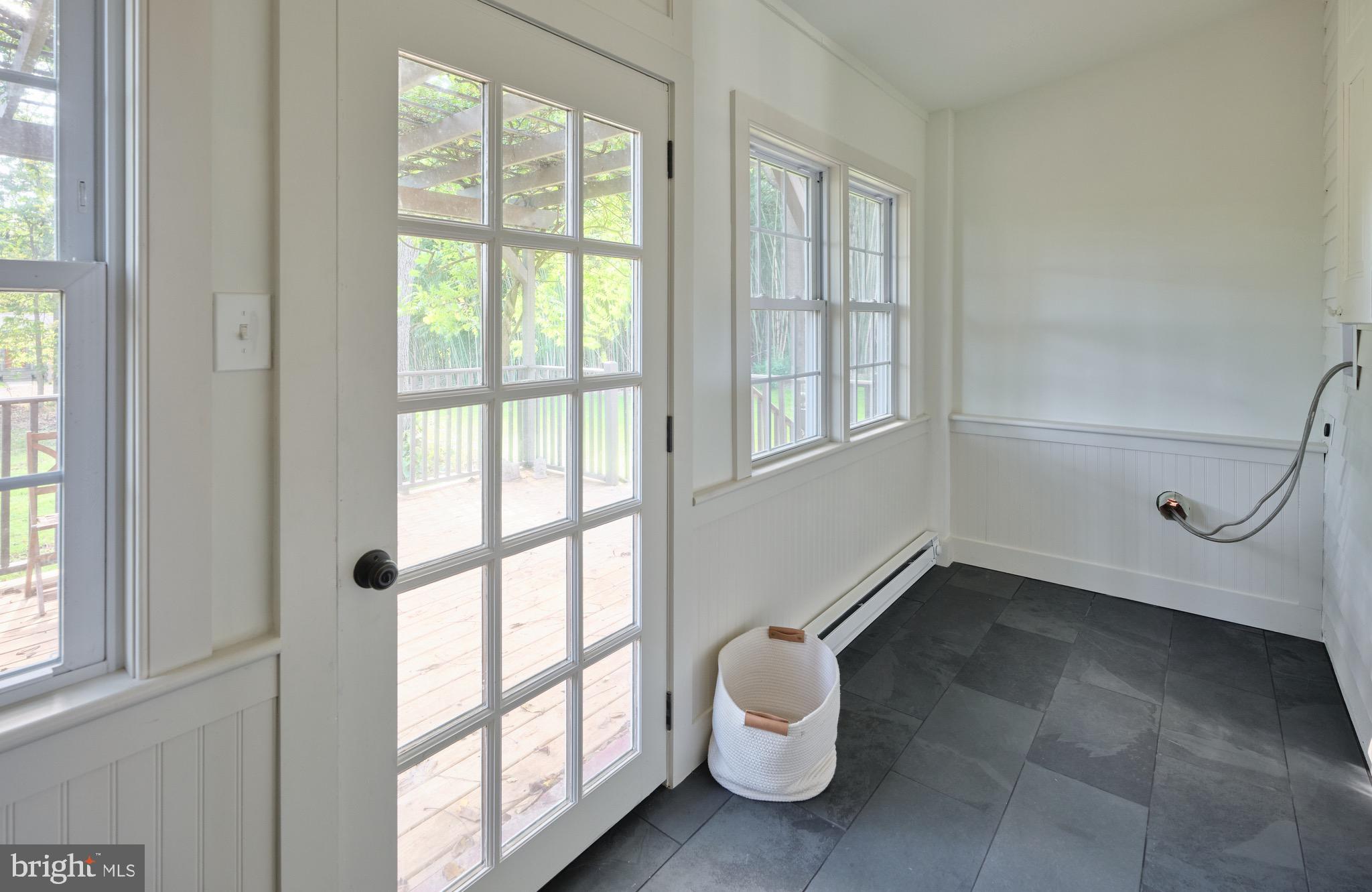 865 Sherers Hill Road Riegelsville, PA 18077 - Photo 18 of 37 a view of an empty room with a window and wooden floor