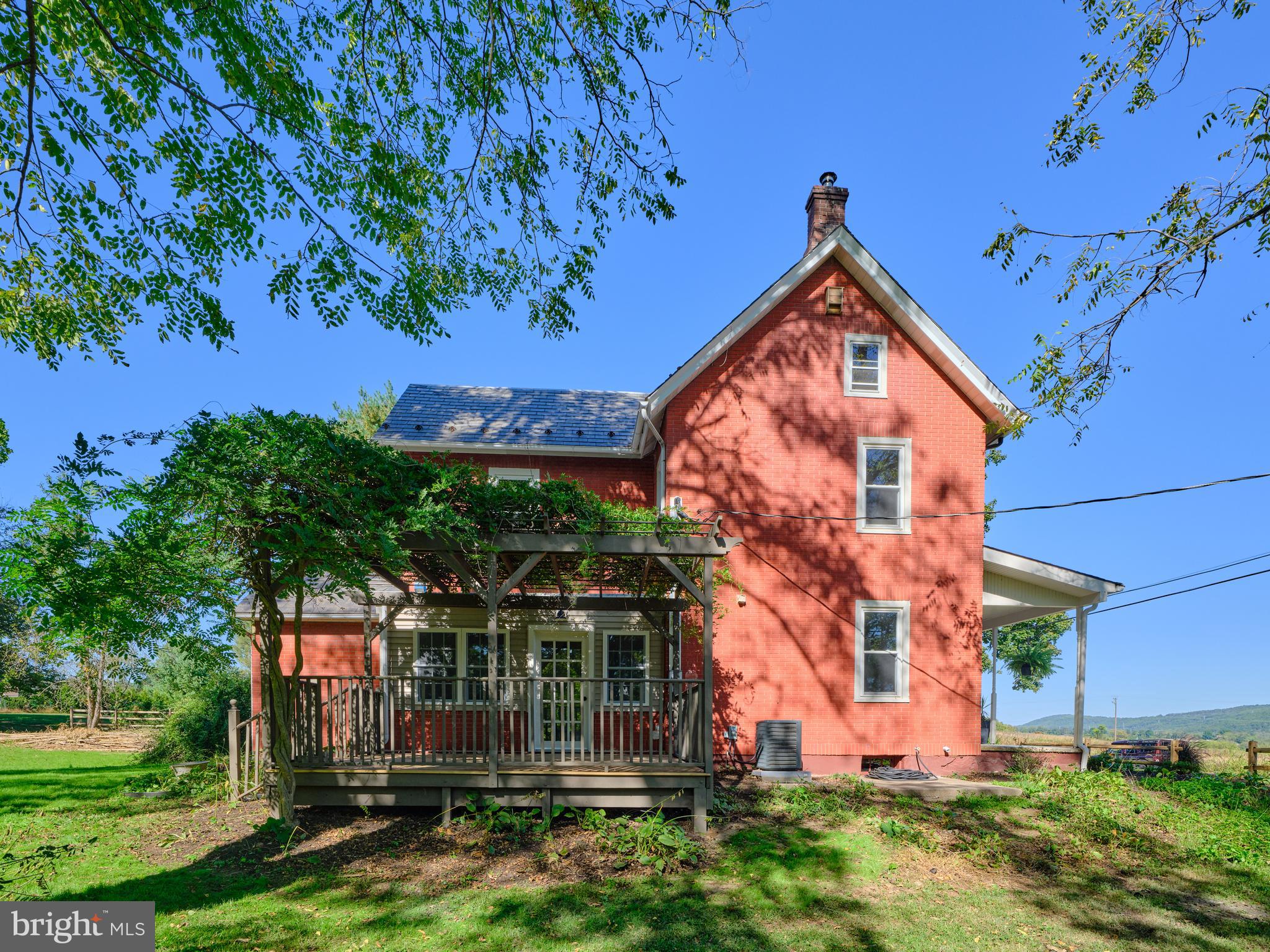 865 Sherers Hill Road Riegelsville, PA 18077 - Photo 29 of 37 front view of a house with a tree
