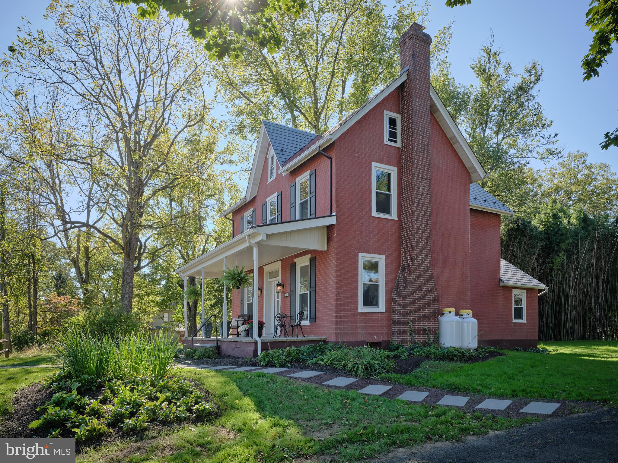 865 Sherers Hill Road Riegelsville, PA 18077 - Photo 3 of 37 front view of a house with a yard