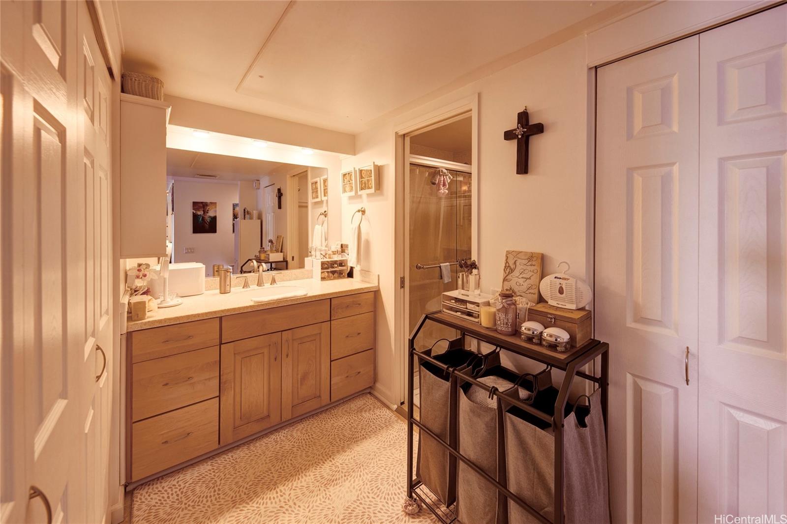 700 Richards Street, Unit 1708 Honolulu, HI 96813 - Photo 12 of 25 a kitchen with a sink appliances and cabinets