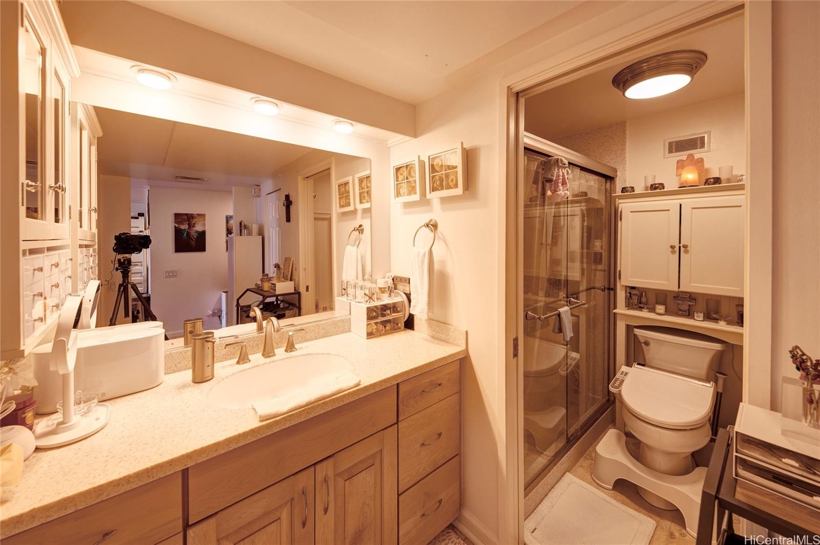 700 Richards Street, Unit 1708 Honolulu, HI 96813 - Photo 14 of 25 a spacious bathroom with a double vanity sink a mirror a bathtub and shower