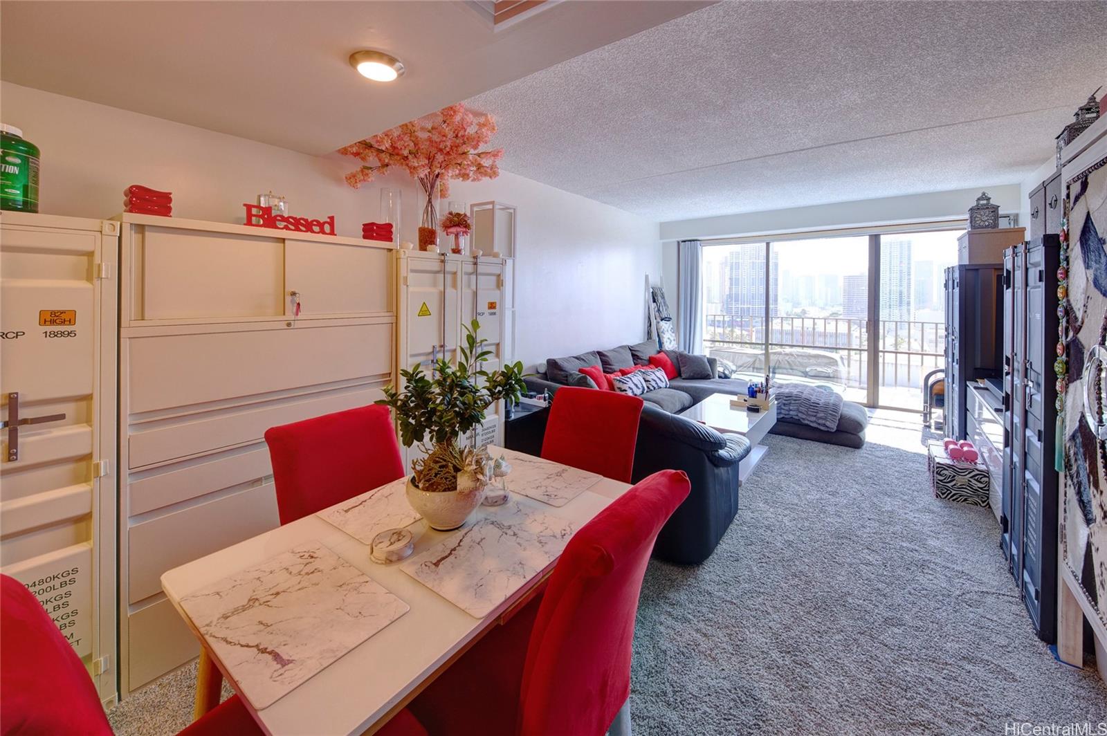 700 Richards Street, Unit 1708 Honolulu, HI 96813 - Photo 5 of 25 a view of a dining room with furniture window and outside view