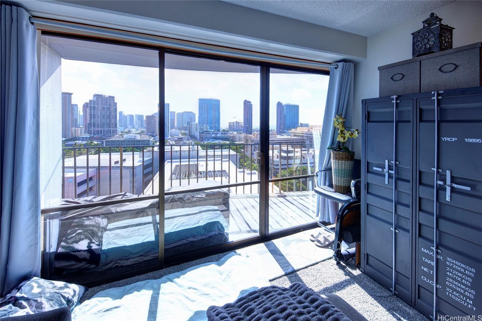 700 Richards Street, Unit 1708 Honolulu, HI 96813 - Photo 8 of 25 a view of a balcony with wooden floor