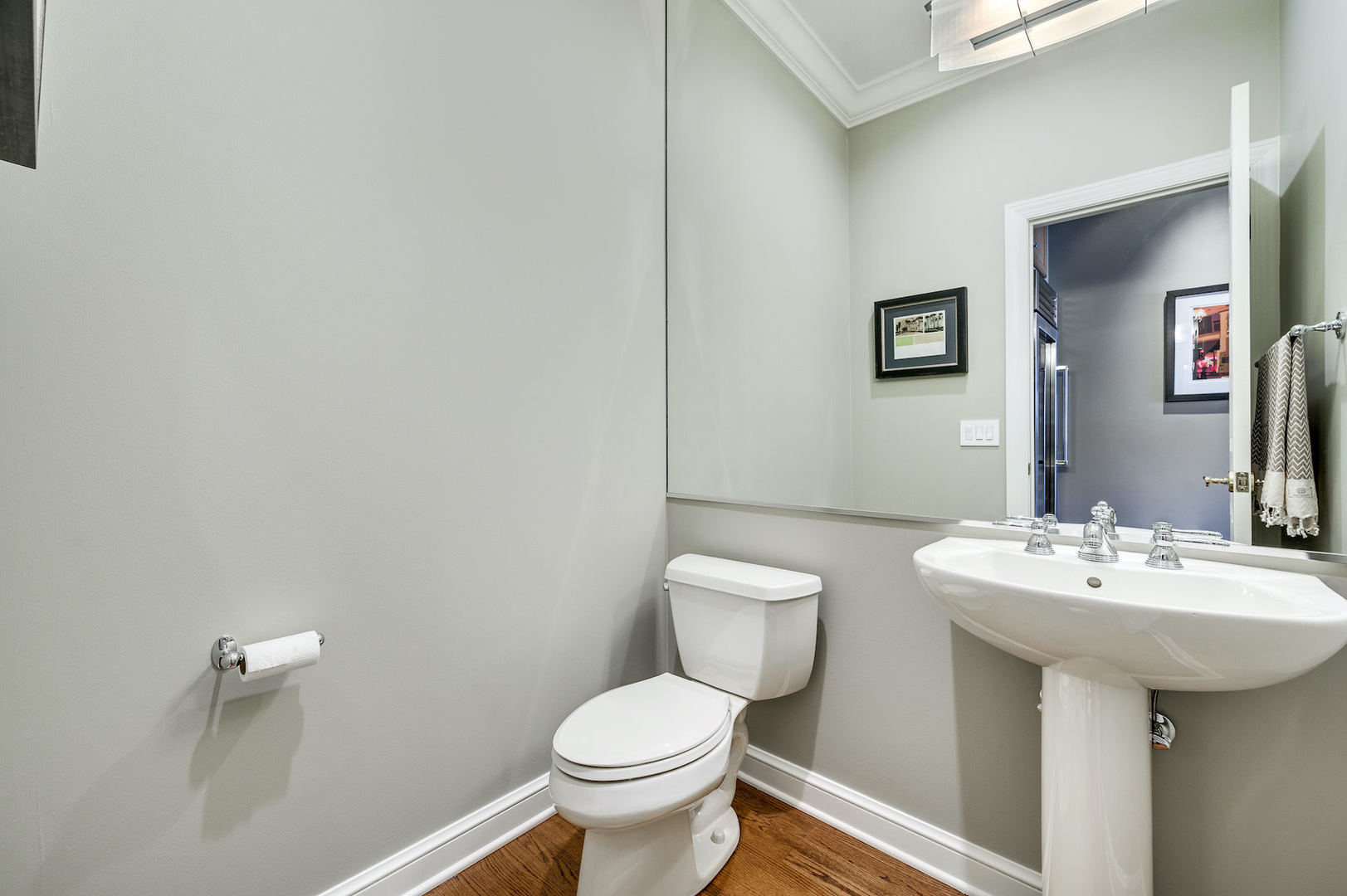 481 North Canal Street Chicago, IL 60654 - Photo 14 of 50 a bathroom with a sink mirror and toilet