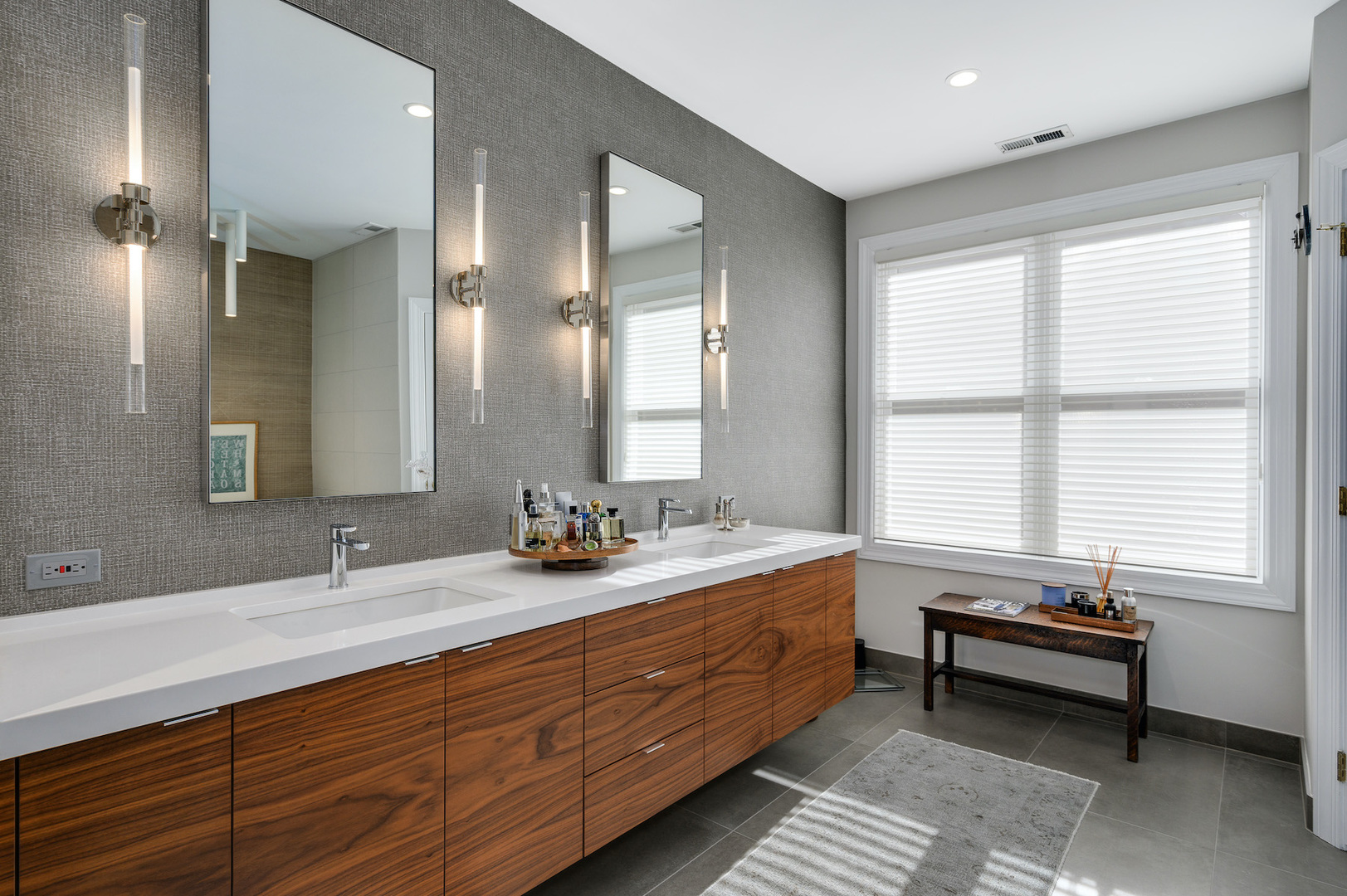 481 North Canal Street Chicago, IL 60654 - Photo 17 of 50 a spacious bathroom with double vanity and a mirror