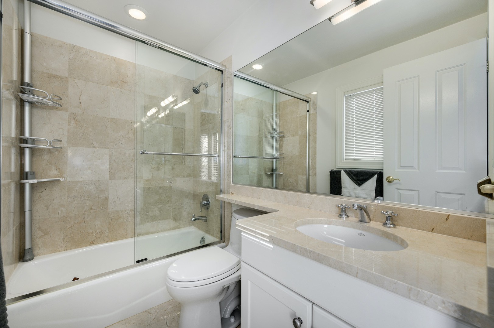 481 North Canal Street Chicago, IL 60654 - Photo 25 of 50 a bathroom with a sink toilet and shower