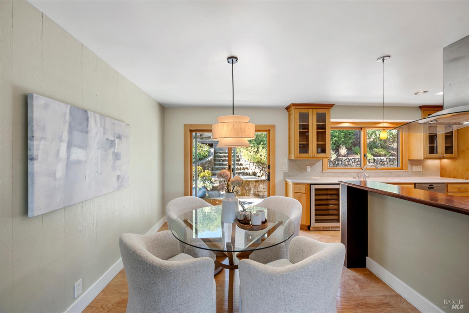 304 High Street Calistoga, CA 94515 - Photo 20 of 53 a dining room with furniture and window