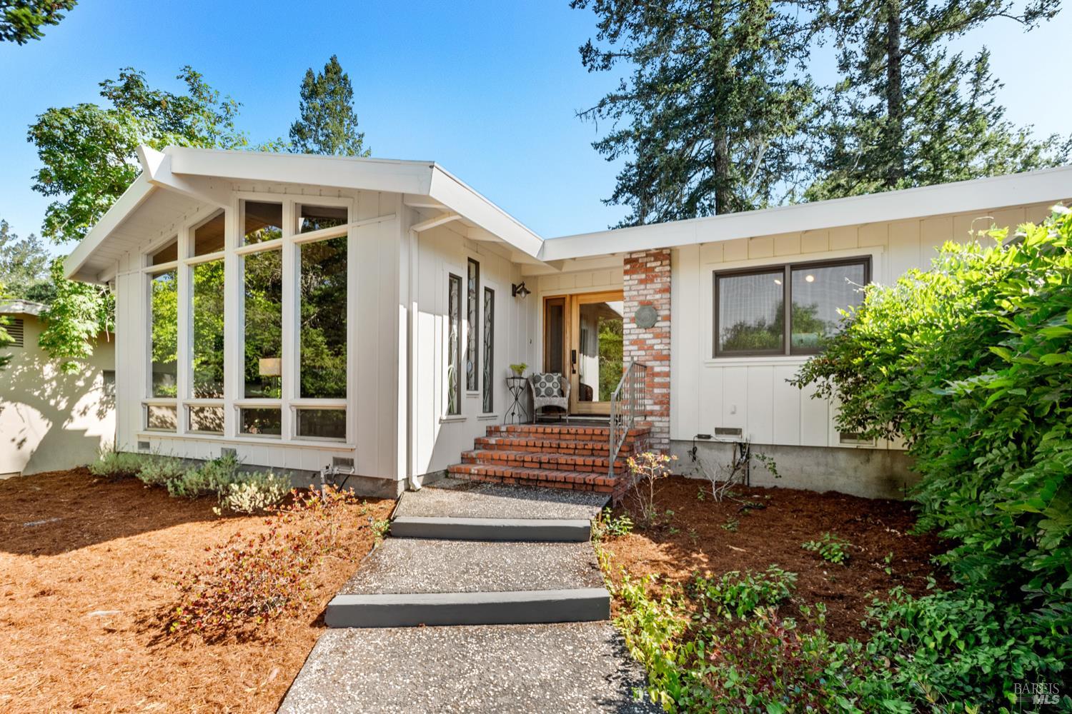 304 High Street Calistoga, CA 94515 - Photo 2 of 53 a front view of a house with a porch