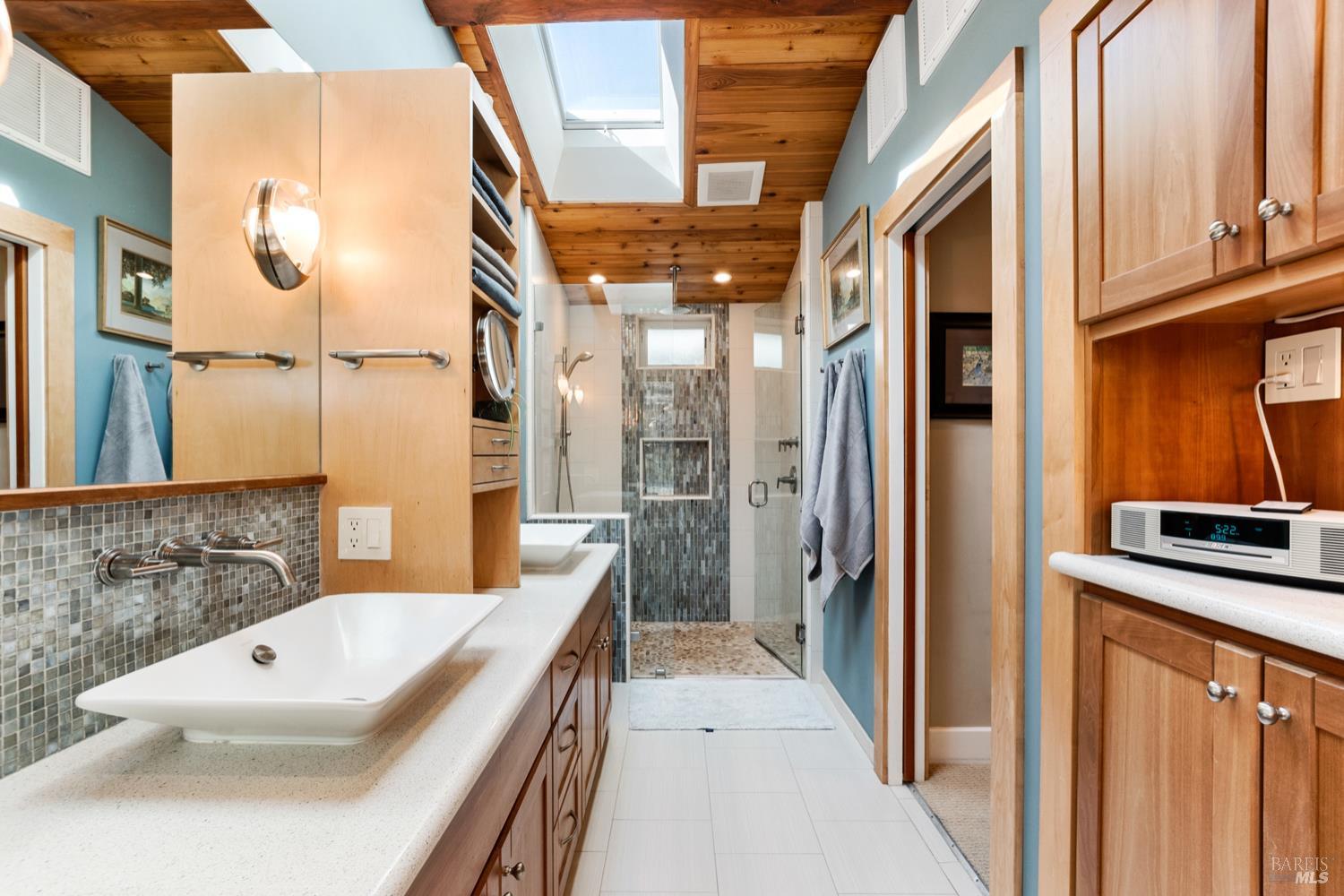 304 High Street Calistoga, CA 94515 - Photo 32 of 53 a bathroom with a tub sink and mirror