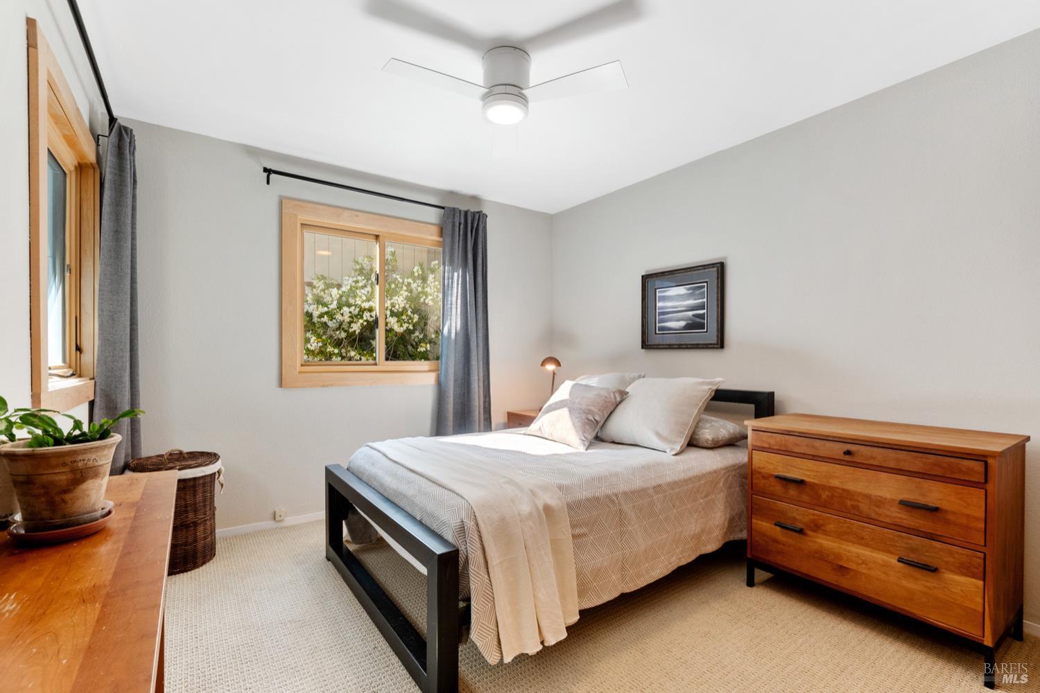 304 High Street Calistoga, CA 94515 - Photo 37 of 53 a bedroom with a bed and a window