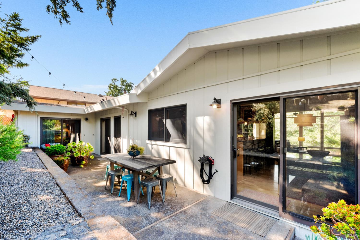 304 High Street Calistoga, CA 94515 - Photo 41 of 53 a patio with yard table and chairs