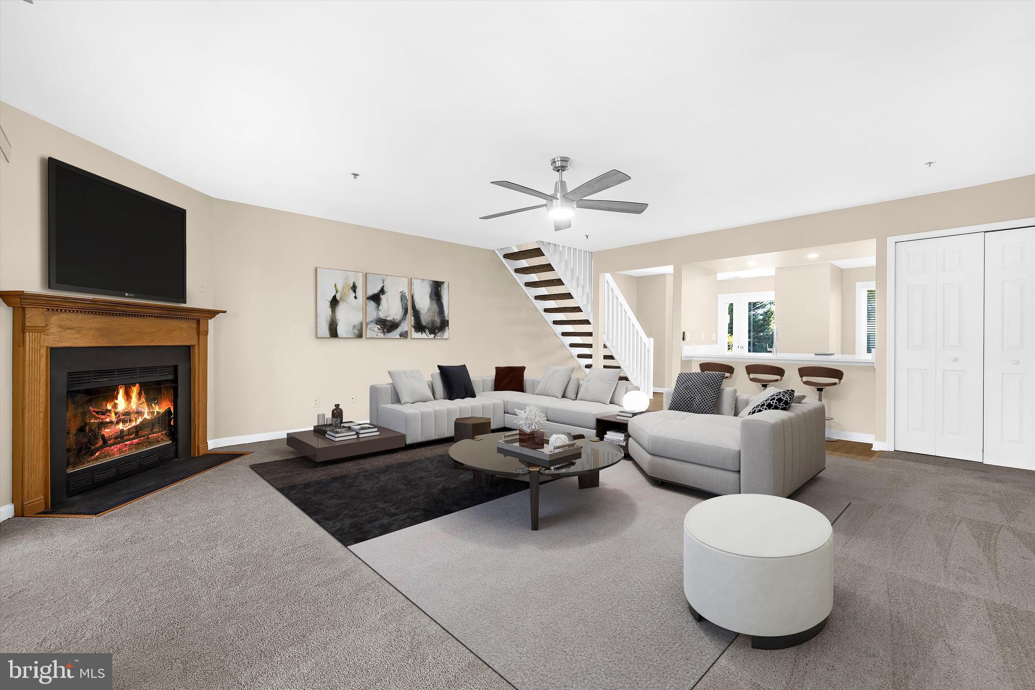30 Queen Mary Court Chester, MD 21619 - Photo 14 of 60 a living room with furniture and a fireplace