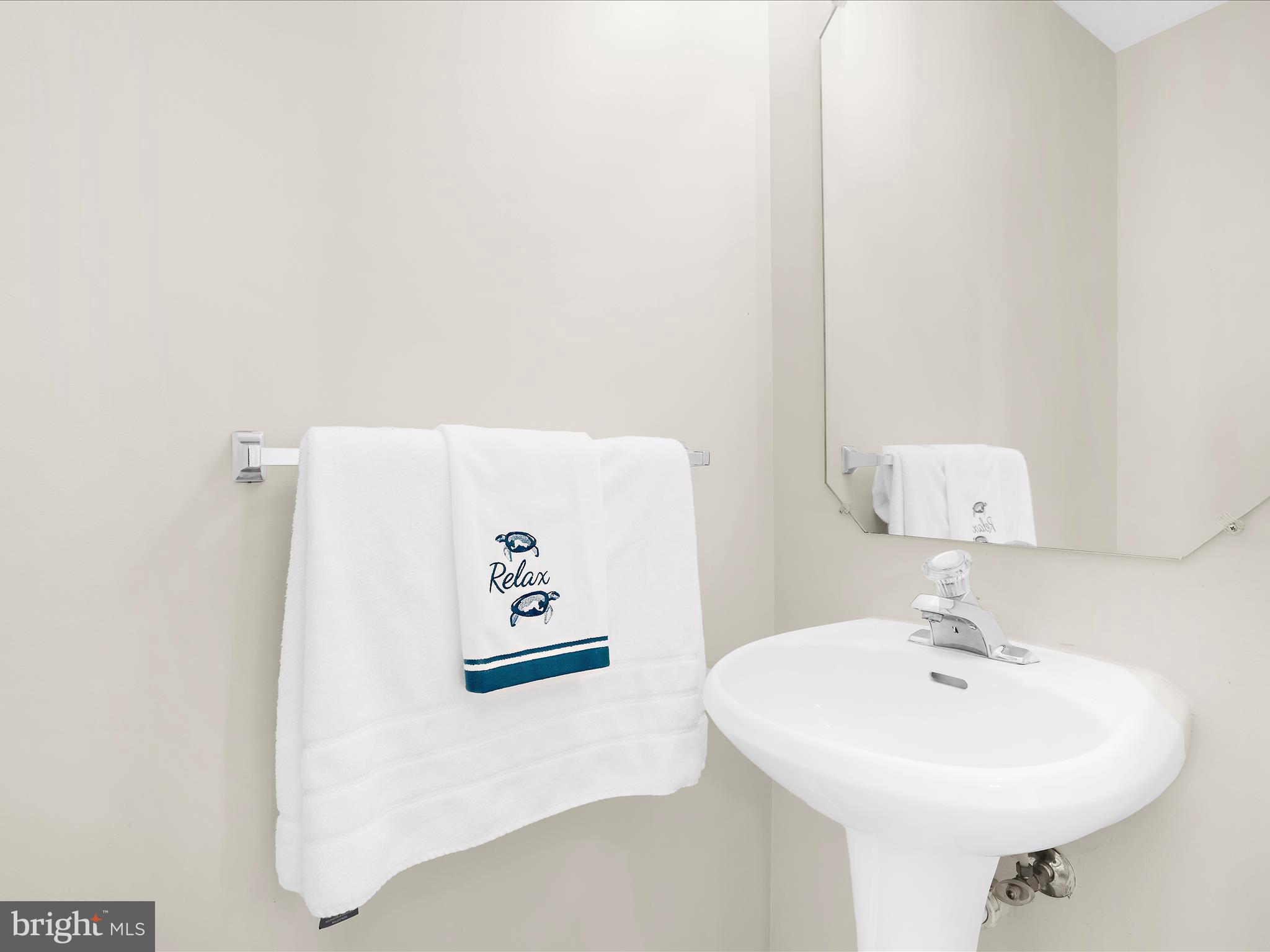 30 Queen Mary Court Chester, MD 21619 - Photo 15 of 60 a bathroom with a sink and a mirror