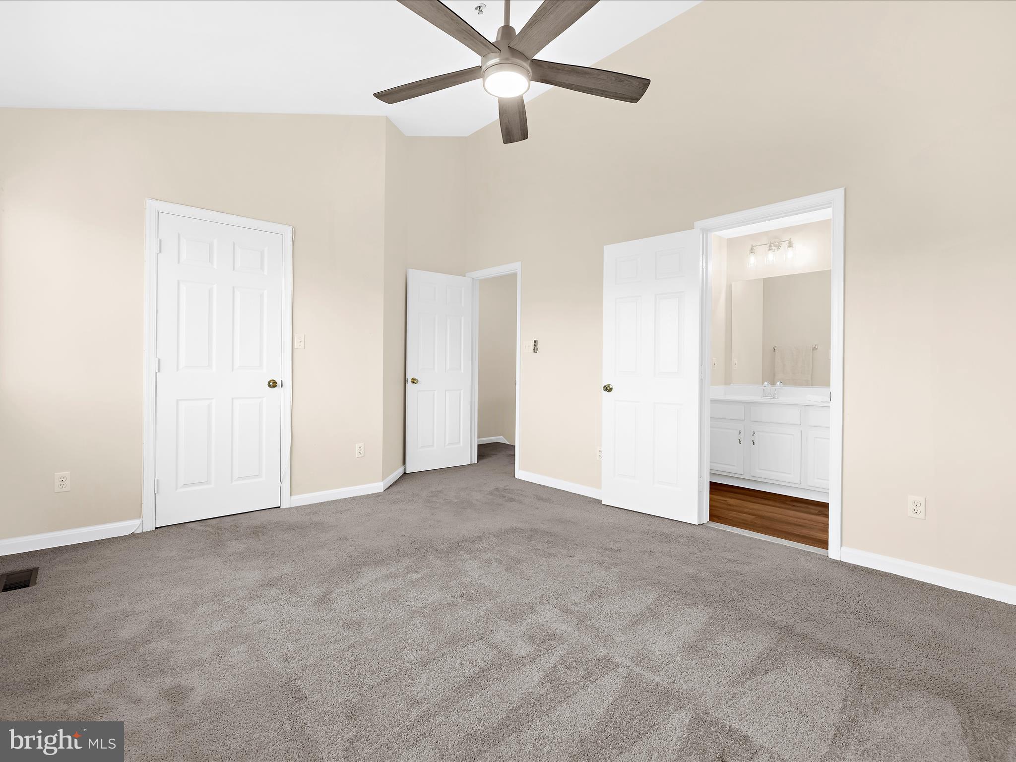 30 Queen Mary Court Chester, MD 21619 - Photo 16 of 60 a view of an empty room with a ceiling fan
