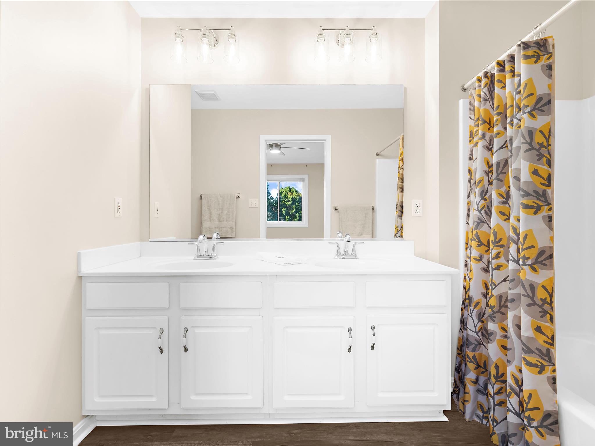 30 Queen Mary Court Chester, MD 21619 - Photo 20 of 60 a bathroom with a sink and a mirror