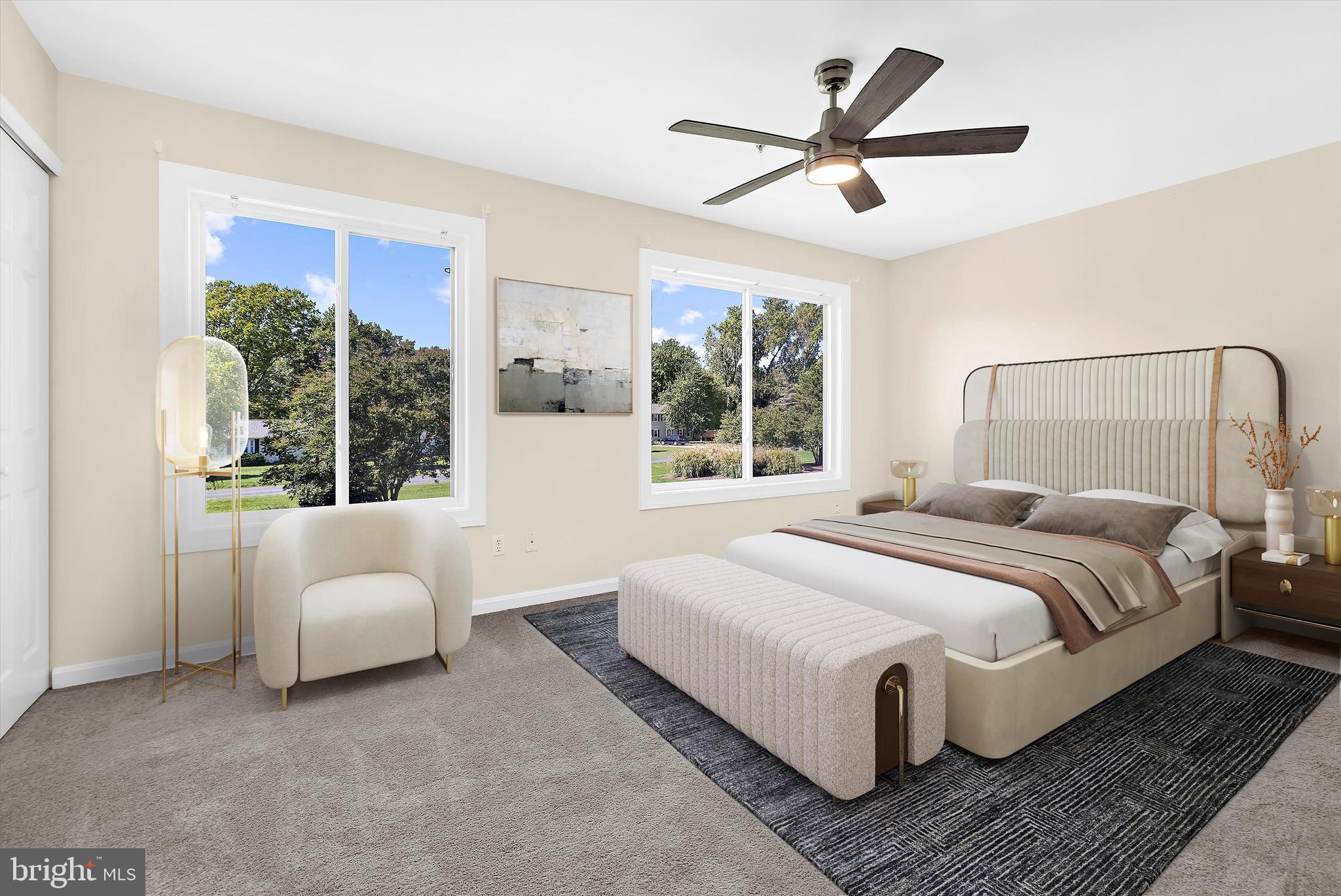 30 Queen Mary Court Chester, MD 21619 - Photo 24 of 60 a bedroom with a bed and large window