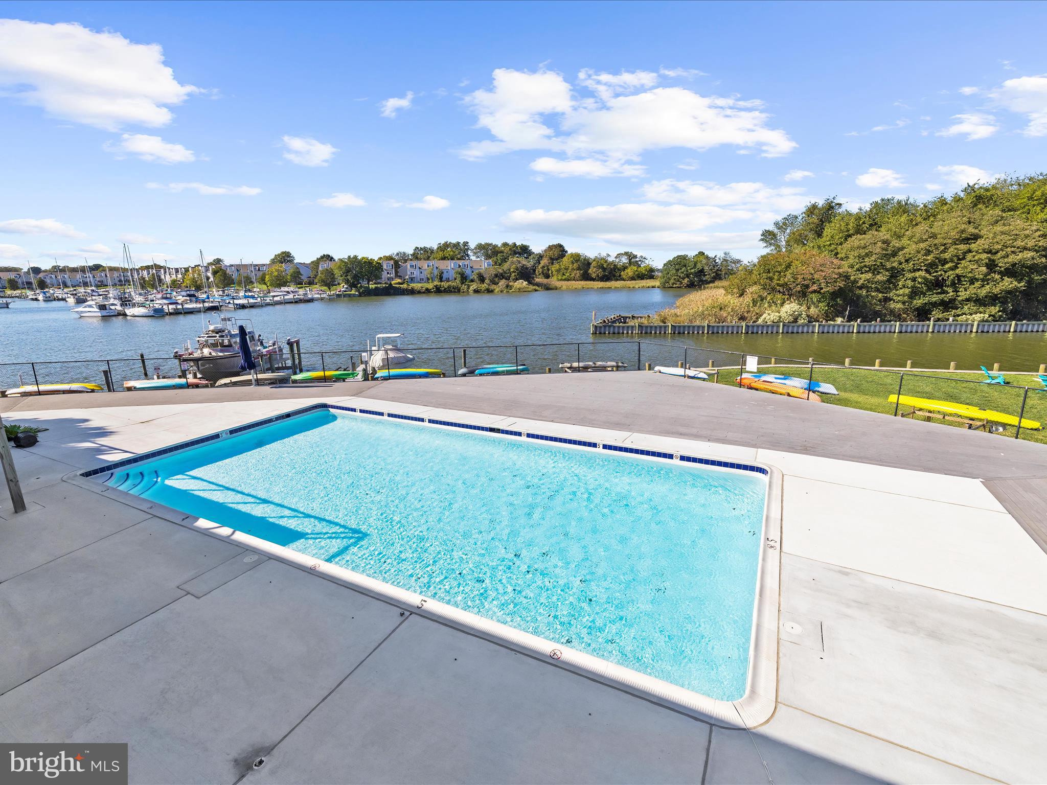 30 Queen Mary Court Chester, MD 21619 - Photo 43 of 60 a view of a swimming pool and lake view