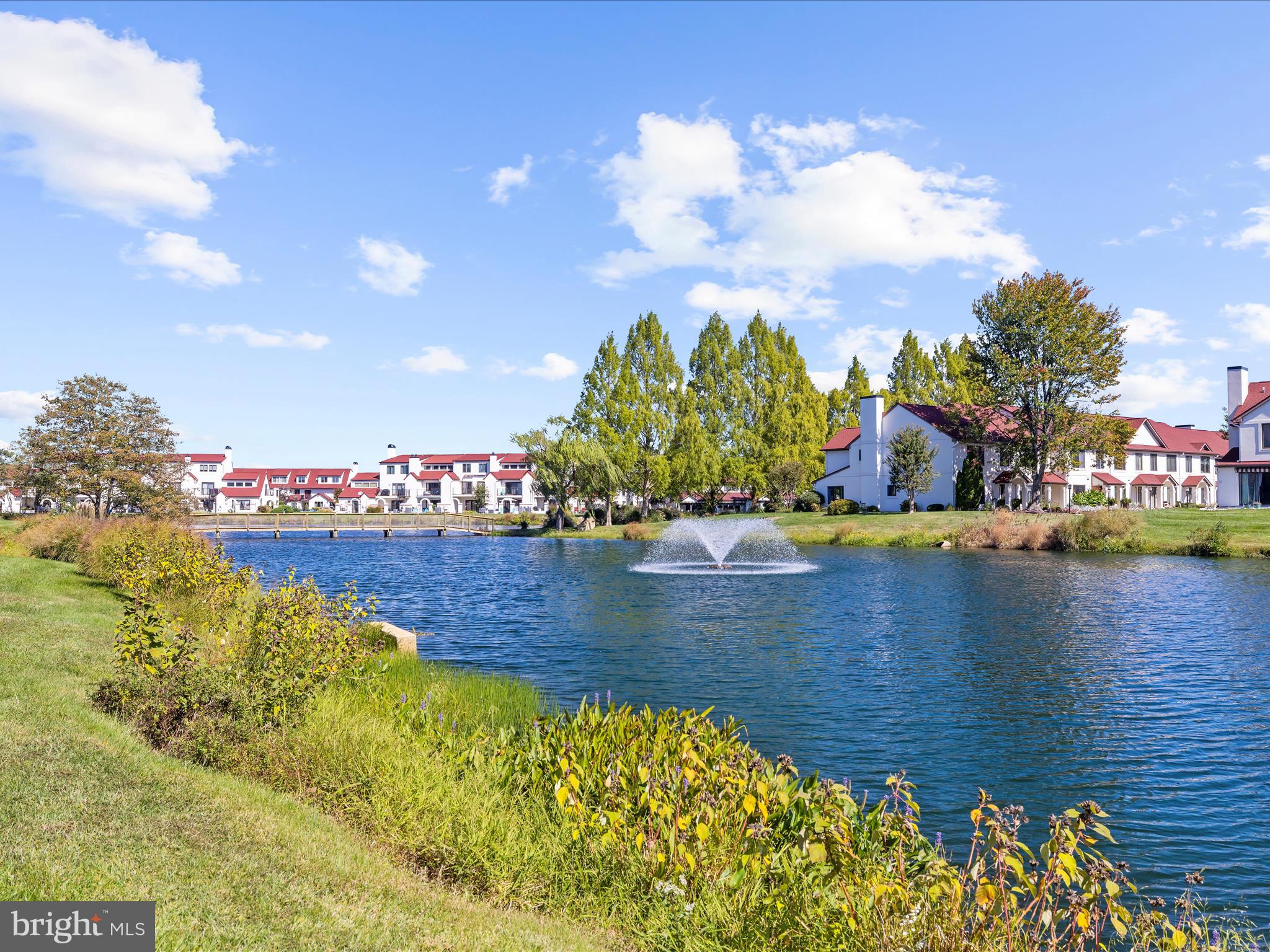 30 Queen Mary Court Chester, MD 21619 - Photo 45 of 60 a view of a lake with a houses