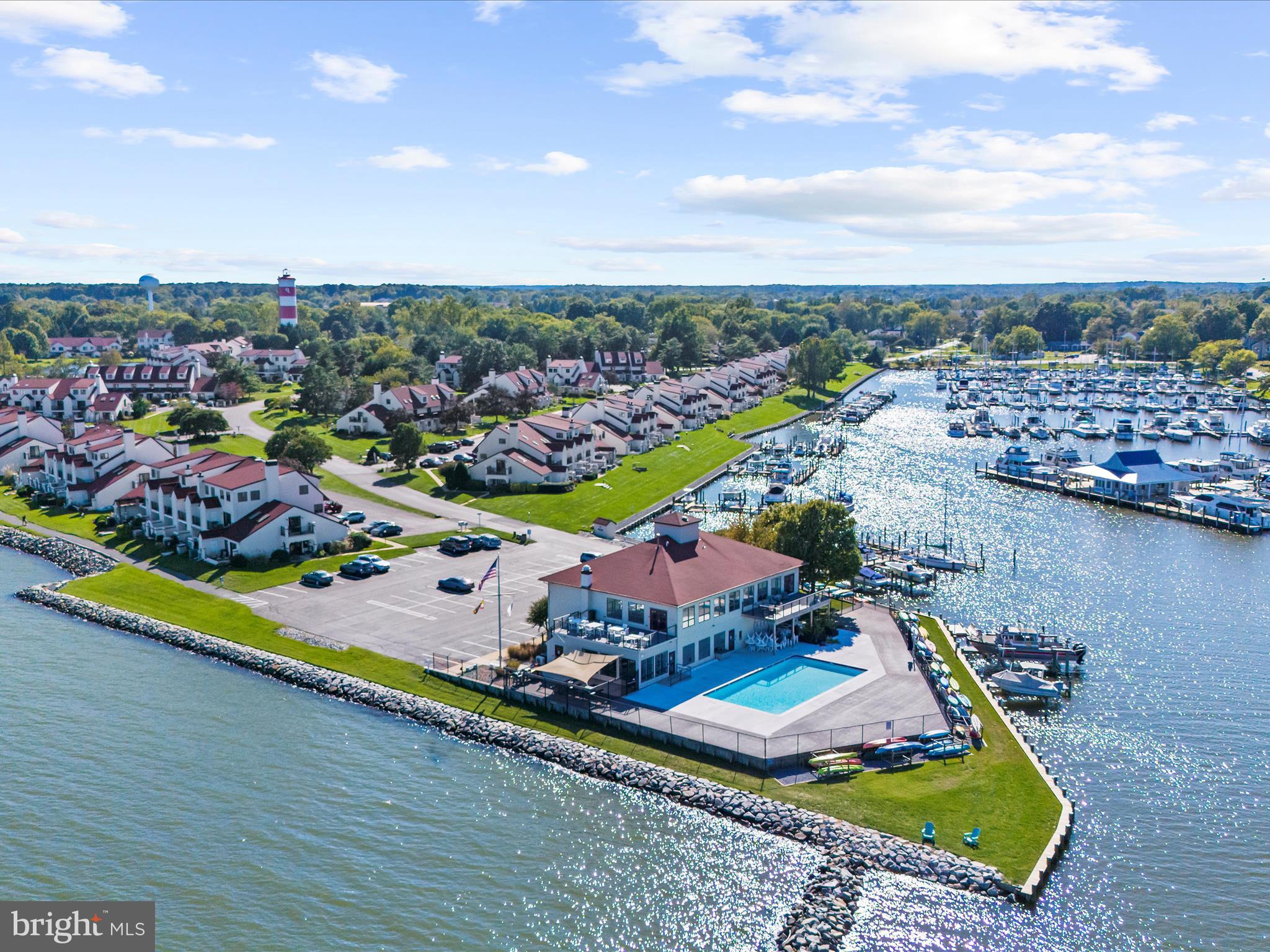 30 Queen Mary Court Chester, MD 21619 - Photo 58 of 60 an aerial view of a house with a garden and lake view