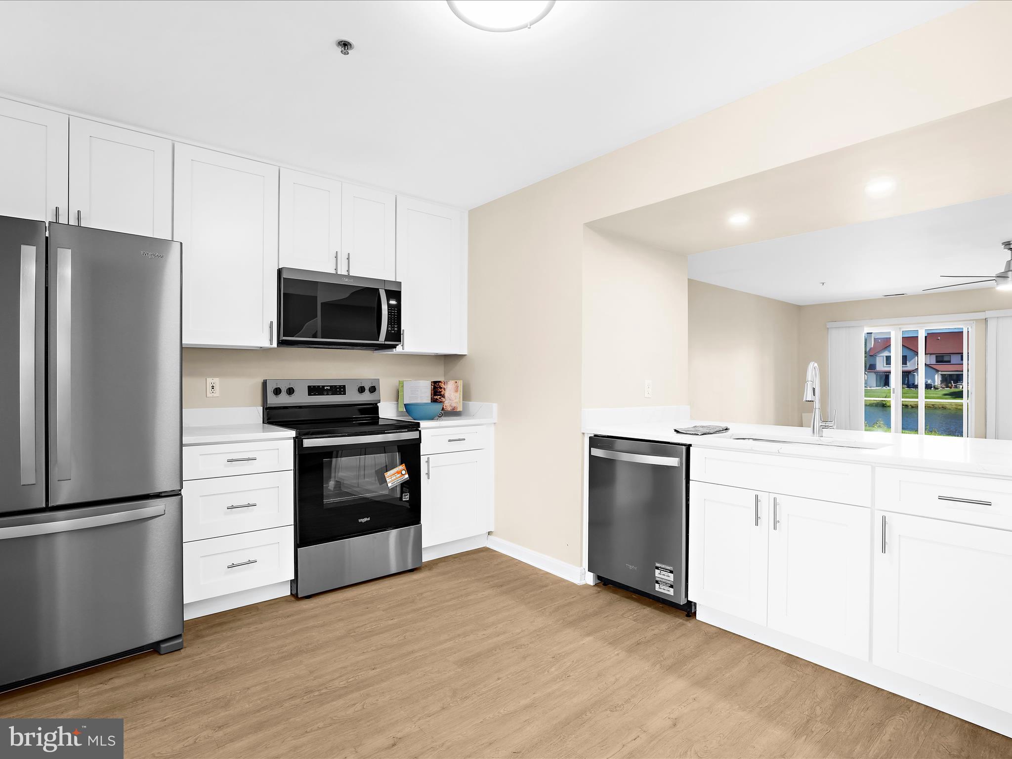 30 Queen Mary Court Chester, MD 21619 - Photo 8 of 60 a kitchen with a refrigerator stove and microwave