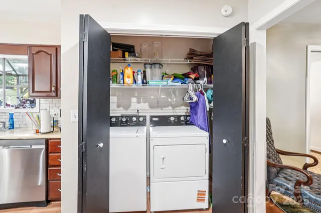 a bedroom with furniture and a wooden floor