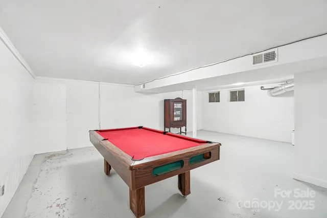 a balcony view with a seating space