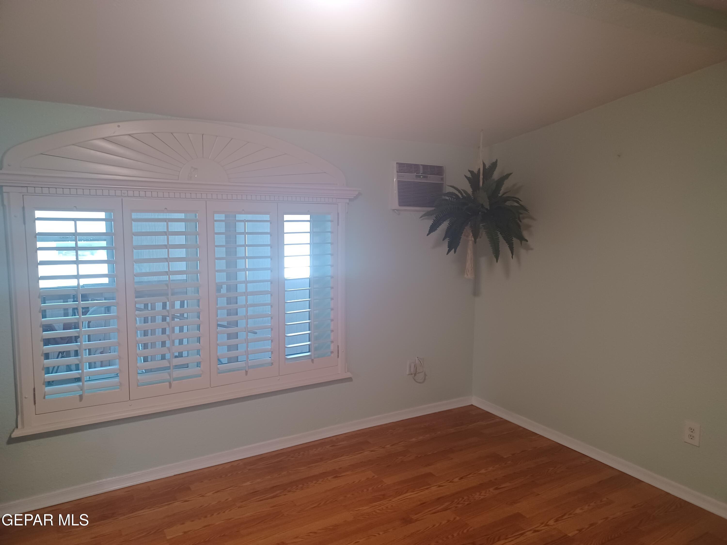 12400 Rojas Drive, Unit 103 El Paso, TX 79928 - Photo 11 of 43 an empty room with a window