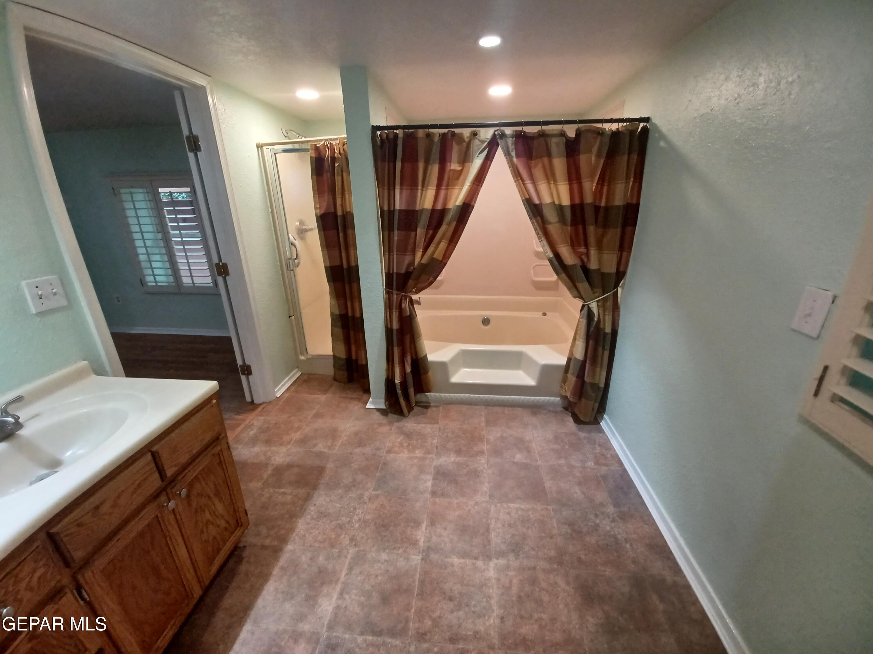 12400 Rojas Drive, Unit 103 El Paso, TX 79928 - Photo 13 of 43 a view of entryway with a bathroom